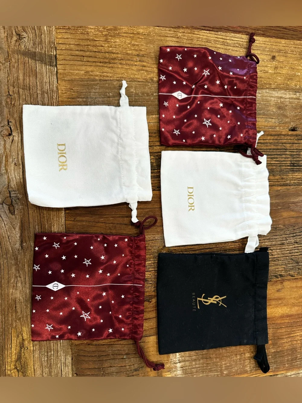 Yves Saint Laurent Black and Gold Drawstring Pouch